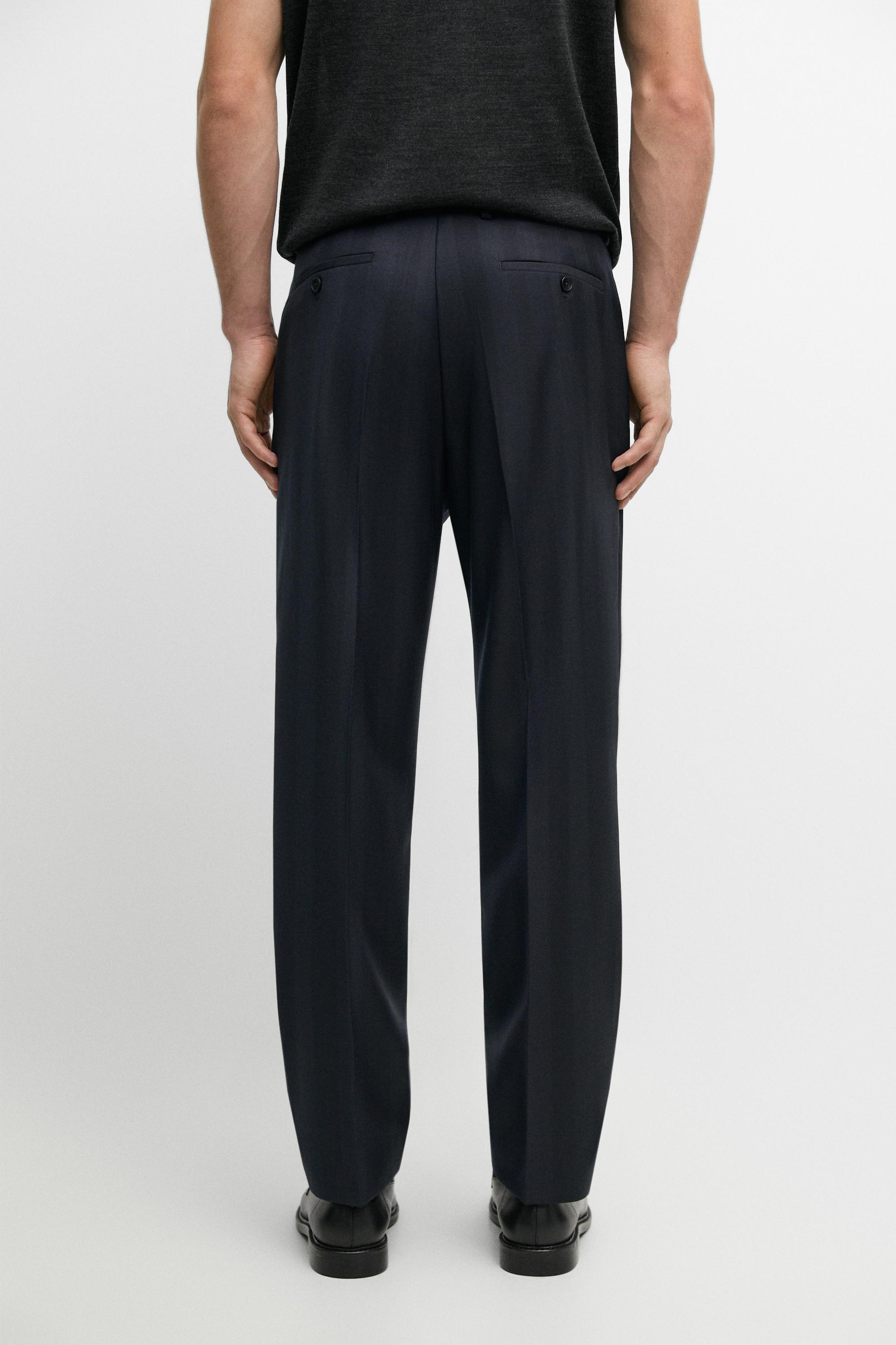 Pantalon tailleur à chevrons